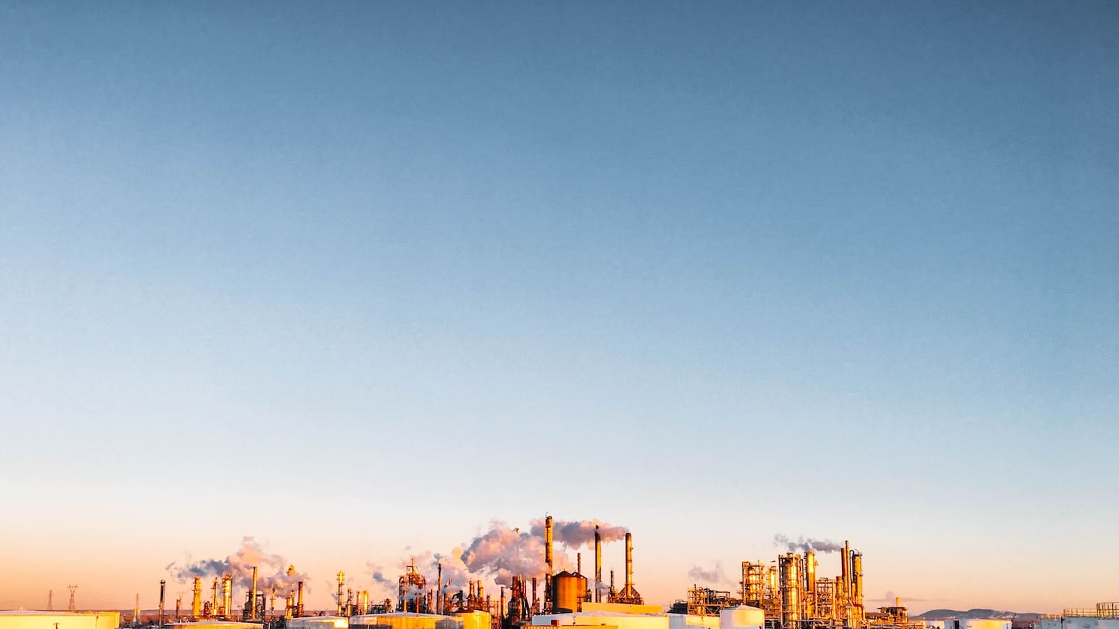 landscape photography of factory at daytime
